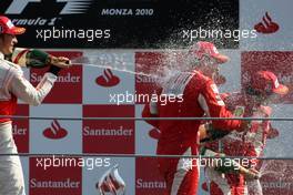 12.09.2010 Monza, Italy,  Jenson Button (GBR), McLaren Mercedes and Fernando Alonso (ESP), Scuderia Ferrari  - Formula 1 World Championship, Rd 14, Italian Grand Prix, Sunday Podium
