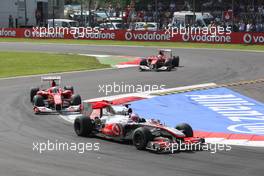 12.09.2010 Monza, Italy,  Jenson Button (GBR), McLaren Mercedes leads Fernando Alonso (ESP), Scuderia Ferrari - Formula 1 World Championship, Rd 14, Italian Grand Prix, Sunday Race