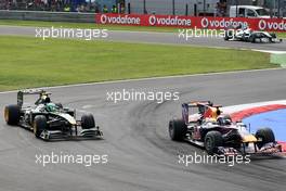 12.09.2010 Monza, Italy,  Heikki Kovalainen (FIN), Lotus F1 Team, Sebastian Vettel (GER), Red Bull Racing - Formula 1 World Championship, Rd 14, Italian Grand Prix, Sunday Race