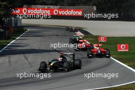 12.09.2010 Monza, Italy,  Jarno Trulli (ITA), Lotus F1 Team, T127 leads Timo Glock (GER), Virgin Racing VR-01 - Formula 1 World Championship, Rd 14, Italian Grand Prix, Sunday Race