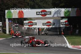 12.09.2010 Monza, Italy,  Fernando Alonso (ESP), Scuderia Ferrari leads Felipe Massa (BRA), Scuderia Ferrari - Formula 1 World Championship, Rd 14, Italian Grand Prix, Sunday Race