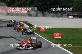 12.09.2010 Monza, Italy,  Felipe Massa (BRA), Scuderia Ferrari and Lewis Hamilton (GBR), McLaren Mercedes in the gravel - Formula 1 World Championship, Rd 14, Italian Grand Prix, Sunday Race