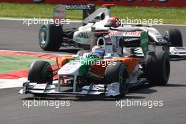 12.09.2010 Monza, Italy,  Adrian Sutil (GER), Force India F1 Team leadsd Michael Schumacher (GER), Mercedes GP Petronas - Formula 1 World Championship, Rd 14, Italian Grand Prix, Sunday Race