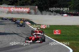 12.09.2010 Monza, Italy,  Fernando Alonso (ESP), Scuderia Ferrari and Lewis Hamilton (GBR), McLaren Mercedes in the gravel - Formula 1 World Championship, Rd 14, Italian Grand Prix, Sunday Race