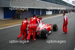 13.02.2010 Jerez, Spain,  Felipe Massa (BRA), Scuderia Ferrari getting pushed back to the garage after stopping on the track - Formula 1 Testing, Jerez, Spain
