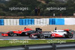 13.02.2010 Jerez, Spain,  Lucas di Grassi (BRA), Virgin Racing VR-01 and Lewis Hamilton (GBR), McLaren Mercedes - Formula 1 Testing, Jerez, Spain
