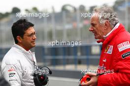 13.02.2010 Jerez, Spain,  Indy Lall (GBR) McLaren Test Team Manager with Mick Ainsley-Cowlishaw (GBR), Ferrari - Formula 1 Testing, Jerez, Spain