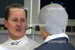 11.02.2010 Jerez, Spain,  Michael Schumacher (GER), Mercedes GP talks with Nico Rosberg (GER), Mercedes GP - Formula 1 Testing, Jerez, Spain