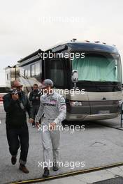 11.02.2010 Jerez, Spain,  Michel Comte (photographer) with Michael Schumacher (GER), Mercedes GP - Formula 1 Testing, Jerez, Spain