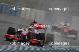 10.02.2010 Jerez, Spain,  Jenson Button (GBR), McLaren Mercedes, MP4-25 leads Fernando Alonso (ESP), Scuderia Ferrari, F10 - Formula 1 Testing, Jerez, Spain