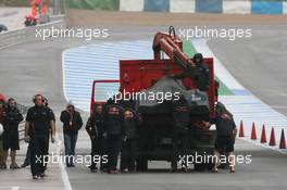 10.02.2010 Jerez, Spain,  Mark Webber (AUS), Red Bull Racing car brought back to the pit lane - Formula 1 Testing, Jerez, Spain