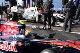 19.02.2010 Jerez, Spain,  Michael Schumacher (GER), Mercedes GP Petronas, Jaime Alguersuari (ESP), Scuderia Toro Rosso - Formula 1 Testing, Jerez, Spain