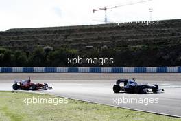 19.02.2010 Jerez, Spain,  Fernando Alonso (ESP), Scuderia Ferrari, Nico Hulkenberg (GER), Williams F1 Team - Formula 1 Testing, Jerez, Spain