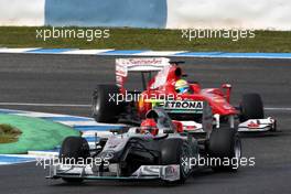 17.02.2010 Jerez, Spain,  Michael Schumacher (GER), Mercedes GP Petronas, Felipe Massa (BRA), Scuderia Ferrari - Formula 1 Testing, Jerez, Spain