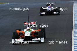 17.02.2010 Jerez, Spain,  Paul di Resta (GBR), Test Driver, Force India F1 Team, VJM03 leads Rubens Barrichello (BRA), Williams F1 Team, FW32 - Formula 1 Testing, Jerez, Spain