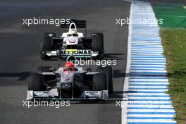 17.02.2010 Jerez, Spain,  Michael Schumacher (GER), Mercedes GP Petronas leads Pedro de la Rosa (ESP), BMW Sauber F1 Team, C29 - Formula 1 Testing, Jerez, Spain
