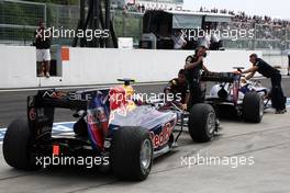 08.10.2010 Suzuka, Japan,  Mark Webber (AUS), Red Bull Racing, Sebastian Vettel (GER), Red Bull Racing - Formula 1 World Championship, Rd 16, Japanese Grand Prix, Friday Practice