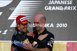 10.10.2010 Suzuka, Japan,  Sebastian Vettel (GER), Red Bull Racing and Adrian Newey (GBR), Red Bull Racing, Technical Operations Director  - Formula 1 World Championship, Rd 16, Japanese Grand Prix, Sunday Podium