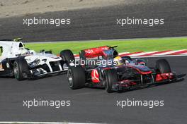 Lewis Hamilton (GBR), McLaren Mercedes and Kamui Kobayashi (JAP), BMW Sauber F1 Team  - Formula 1 World Championship, Rd 16, Japanese Grand Prix, Sunday Race