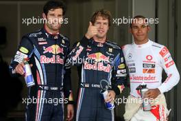 10.10.2010 Suzuka, Japan,  Mark Webber (AUS), Red Bull Racing, Sebastian Vettel (GER), Red Bull Racing and Lewis Hamilton (GBR), McLaren Mercedes  - Formula 1 World Championship, Rd 16, Japanese Grand Prix, Sunday Qualifying