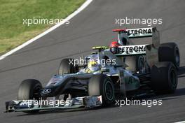 10.10.2010 Suzuka, Japan,  Nico Rosberg (GER), Mercedes GP and Michael Schumacher (GER), Mercedes GP  - Formula 1 World Championship, Rd 16, Japanese Grand Prix, Sunday Race