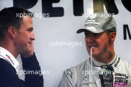 09.10.2010 Suzuka, Japan,  Ralf Schumacher (GER) with his brother Michael Schumacher (GER), Mercedes GP Petronas - Formula 1 World Championship, Rd 16, Japanese Grand Prix, Saturday Practice