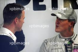 09.10.2010 Suzuka, Japan,  Ralf Schumacher (GER) with his brother Michael Schumacher (GER), Mercedes GP Petronas - Formula 1 World Championship, Rd 16, Japanese Grand Prix, Saturday Practice
