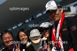 07.10.2010 Suzuka, Japan,  Japanese fans, Michael Schumacher (GER), Mercedes GP  - Formula 1 World Championship, Rd 16, Japanese Grand Prix, Thursday