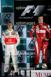 Lewis Hamilton (GBR), McLaren Mercedes and Fernando Alonso (ESP), Scuderia Ferrari  - Formula 1 World Championship, Rd 17, Korean Grand Prix, Sunday Podium