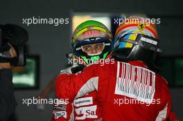 24.10.2010 Yeongam, Korea,  Felipe Massa (BRA), Scuderia Ferrari and 1st place Fernando Alonso (ESP), Scuderia Ferrari - Formula 1 World Championship, Rd 17, Korean Grand Prix, Sunday Podium