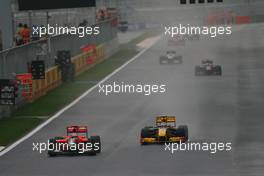 24.10.2010 Yeongam, Korea,  Timo Glock (GER), Virgin Racing leads Robert Kubica (POL), Renault F1 Team - Formula 1 World Championship, Rd 17, Korean Grand Prix, Sunday Race
