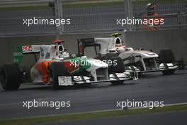 24.10.2010 Yeongam, Korea,  Kamui Kobayashi (JAP), BMW Sauber F1 Team and Adrian Sutil (GER), Force India F1 Team  - Formula 1 World Championship, Rd 17, Korean Grand Prix, Sunday Race