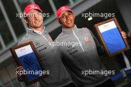 23.10.2010 Yeongam, Korea,  Jenson Button (GBR), McLaren Mercedes and Lewis Hamilton (GBR), McLaren Mercedes, hand printing session - Formula 1 World Championship, Rd 17, Korean Grand Prix, Saturday