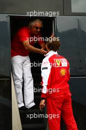 15.05.2010 Monaco, Monte Carlo,  Flavio Briatore (ITA) on Bernie Ecclestone's (GBR) motorhome - Formula 1 World Championship, Rd 6, Monaco Grand Prix, Saturday