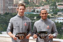 12.05.2010 Monaco, Monte Carlo,  Jenson Button (GBR), McLaren Mercedes, Lewis Hamilton (GBR), McLaren Mercedes with Monaco editiion helmets and steering wheels with Steinmetz Diamonds  - Formula 1 World Championship, Rd 6, Monaco Grand Prix, Wednesday