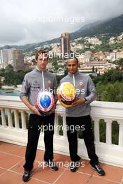 12.05.2010 Monaco, Monte Carlo,  Jenson Button (GBR), McLaren Mercedes, Lewis Hamilton (GBR), McLaren Mercedes with Monaco editiion helmets and steering wheels with Steinmetz Diamonds  - Formula 1 World Championship, Rd 6, Monaco Grand Prix, Wednesday