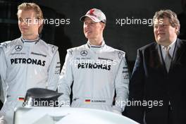 25.01.2010 Stuttgart, Germany,  CAR presentation with Michael Schumacher (GER, Mercedes GP Petronas F1 Team) and Nico Rosberg (GER / MCO, Mercedes GP Petronas F1 Team) / Norbert Haug  Mercedes Heads and the drivers in front of the Museum - Mercedes GP Presentation