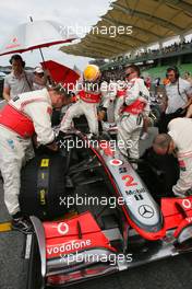 04.04.2010 Kuala Lumpur, Malaysia,  Lewis Hamilton (GBR), McLaren Mercedes  - Formula 1 World Championship, Rd 3, Malaysian Grand Prix, Sunday Pre-Race Grid