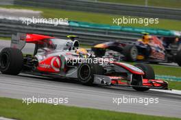 04.04.2010 Kuala Lumpur, Malaysia,  Lewis Hamilton (GBR), McLaren Mercedes and Mark Webber (AUS), Red Bull Racing  - Formula 1 World Championship, Rd 3, Malaysian Grand Prix, Sunday Race