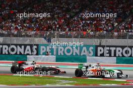 04.04.2010 Kuala Lumpur, Malaysia,  Adrian Sutil (GER), Force India F1 Team leads Lewis Hamilton (GBR), McLaren Mercedes, MP4-25 - Formula 1 World Championship, Rd 3, Malaysian Grand Prix, Sunday Race