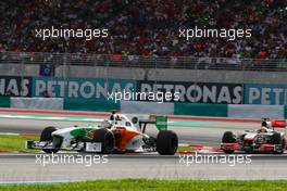 04.04.2010 Kuala Lumpur, Malaysia,  Adrian Sutil (GER), Force India F1 Team, VJM-02 leads Lewis Hamilton (GBR), McLaren Mercedes, MP4-25 - Formula 1 World Championship, Rd 3, Malaysian Grand Prix, Sunday Race