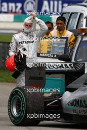 04.04.2010 Kuala Lumpur, Malaysia,  Michael Schumacher (GER), Mercedes GP Petronas, stops on the circuit - Formula 1 World Championship, Rd 3, Malaysian Grand Prix, Sunday Race