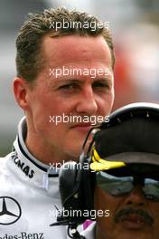 04.04.2010 Kuala Lumpur, Malaysia,  Michael Schumacher (GER), Mercedes GP stops on track  because of a wheel technical problem - Formula 1 World Championship, Rd 3, Malaysian Grand Prix, Sunday Race