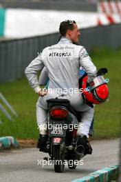 04.04.2010 Kuala Lumpur, Malaysia,  Michael Schumacher (GER), Mercedes GP stops on track  because of a wheel technical problem - Formula 1 World Championship, Rd 3, Malaysian Grand Prix, Sunday Race