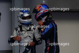 03.04.2010 Kuala Lumpur, Malaysia,  Rubens Barrichello (BRA), Williams F1 Team and Mark Webber (AUS), Red Bull Racing - Formula 1 World Championship, Rd 3, Malaysian Grand Prix, Saturday Qualifying