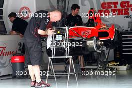 01.04.2010 Kuala Lumpur, Malaysia,  The Virgin Team work on their cars - Formula 1 World Championship, Rd 3, Malaysian Grand Prix, Thursday