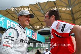 01.04.2010 Kuala Lumpur, Malaysia,  Michael Schumacher (GER), Mercedes GP Petronas and Stefano Domenicali (ITA) Ferrari General Director - Formula 1 World Championship, Rd 3, Malaysian Grand Prix, Thursday
