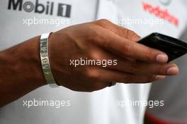 01.04.2010 Kuala Lumpur, Malaysia,  The bracelet of Lewis Hamilton (GBR), McLaren Mercedes, for the 46664 charity - Formula 1 World Championship, Rd 3, Malaysian Grand Prix, Thursday