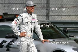 01.04.2010 Kuala Lumpur, Malaysia,  Michael Schumacher (GER), Mercedes GP and the safety car - Formula 1 World Championship, Rd 3, Malaysian Grand Prix, Thursday