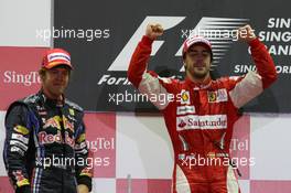 26.09.2010 Singapore, Singapore,  Sebastian Vettel (GER), Red Bull Racing with 1st place Fernando Alonso (ESP), Scuderia Ferrari  - Formula 1 World Championship, Rd 15, Singapore Grand Prix, Sunday Podium